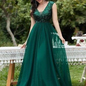 Worn once to wedding event. In great condition.